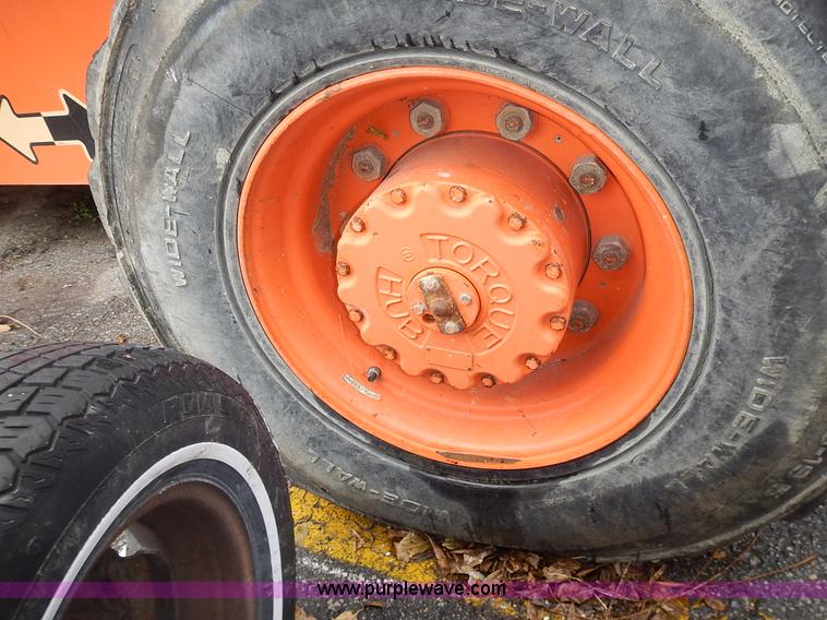 image for item J6345 1999 JLG 80HX boom lift