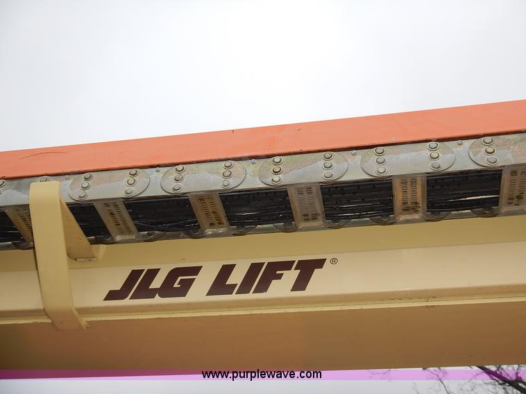 image for item J6345 1999 JLG 80HX boom lift