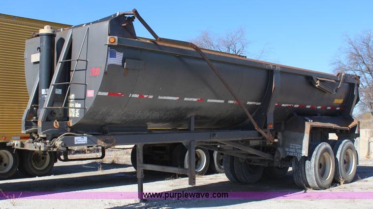 image for item J7736 1999 Travis HRS end dump trailer