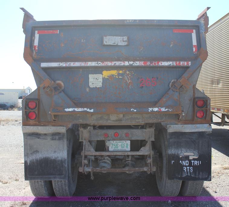 image for item J7736 1999 Travis HRS end dump trailer