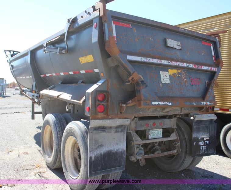 image for item J7736 1999 Travis HRS end dump trailer