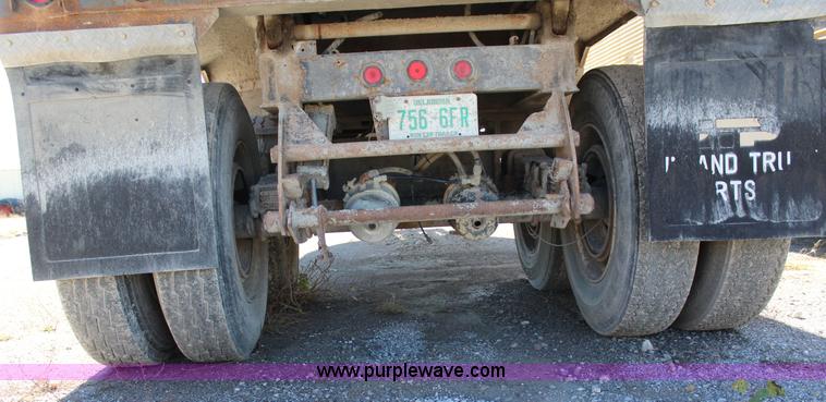 image for item J7736 1999 Travis HRS end dump trailer