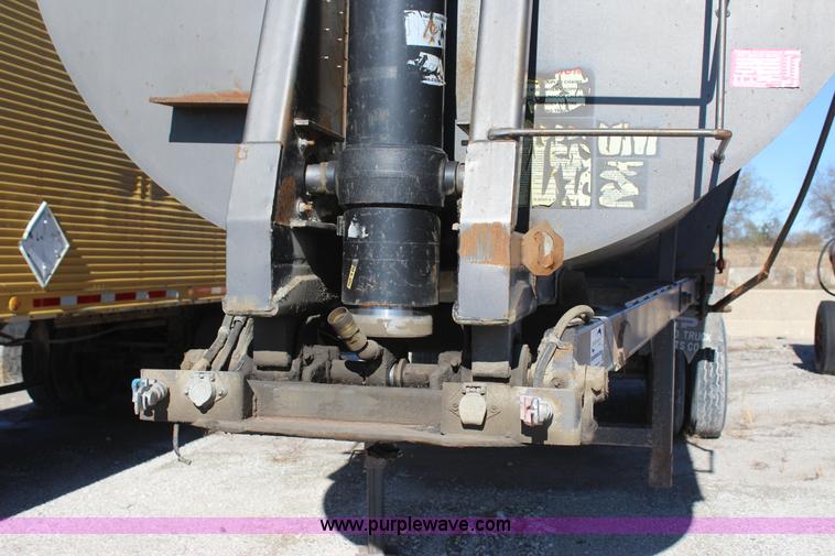 image for item J7736 1999 Travis HRS end dump trailer