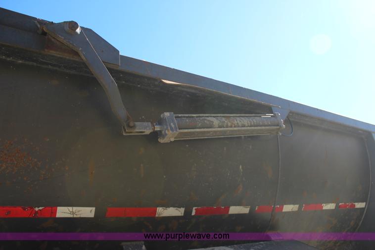 image for item J7736 1999 Travis HRS end dump trailer