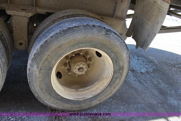 image for item J7736 1999 Travis HRS end dump trailer