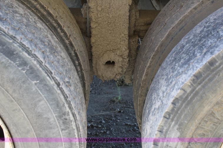 image for item J7736 1999 Travis HRS end dump trailer