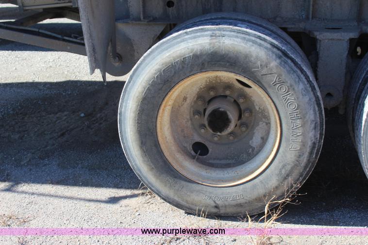 image for item J7736 1999 Travis HRS end dump trailer