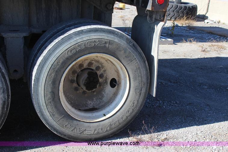 image for item J7736 1999 Travis HRS end dump trailer