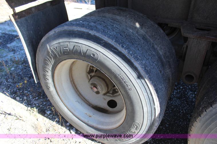 image for item J7738 1998 Travis HRS end dump trailer