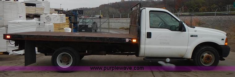 image for item L3573 1999 Ford F350 Super Duty XL flatbed pickup truck