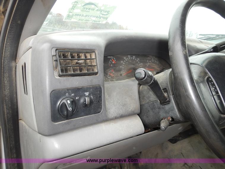 image for item L3573 1999 Ford F350 Super Duty XL flatbed pickup truck