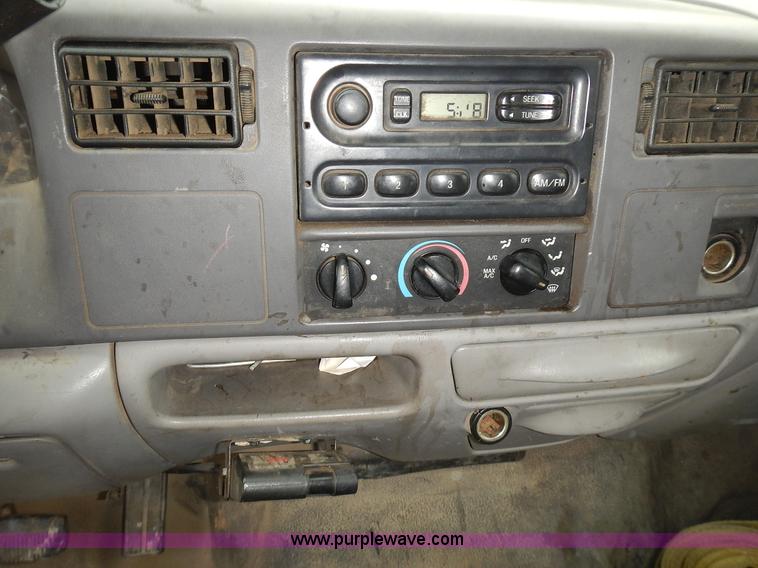 image for item L3573 1999 Ford F350 Super Duty XL flatbed pickup truck