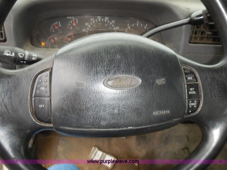 image for item L3573 1999 Ford F350 Super Duty XL flatbed pickup truck