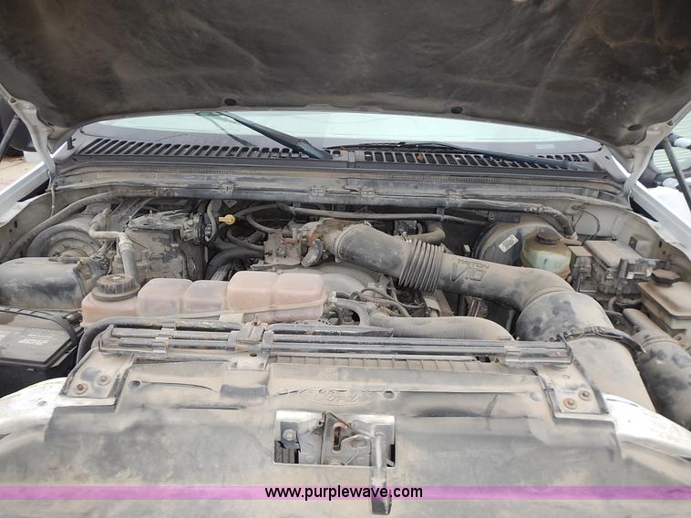 image for item L3573 1999 Ford F350 Super Duty XL flatbed pickup truck