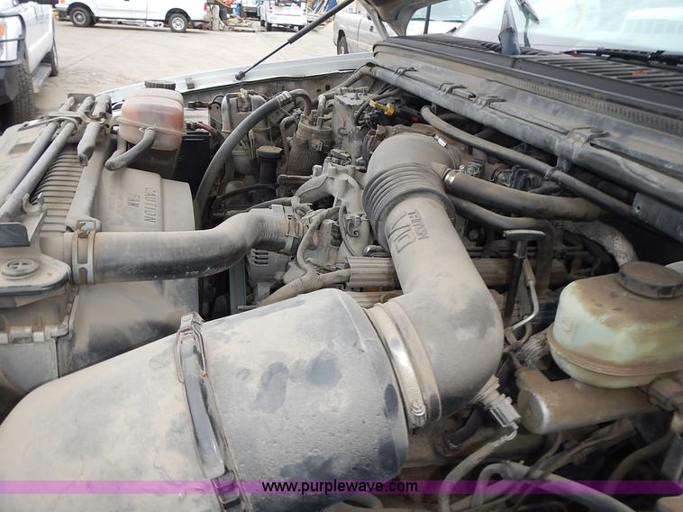 image for item L3573 1999 Ford F350 Super Duty XL flatbed pickup truck