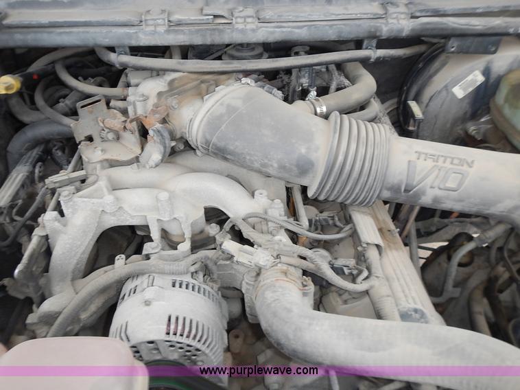 image for item L3573 1999 Ford F350 Super Duty XL flatbed pickup truck