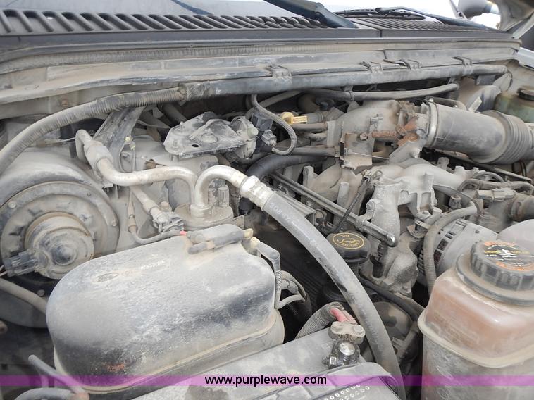 image for item L3573 1999 Ford F350 Super Duty XL flatbed pickup truck