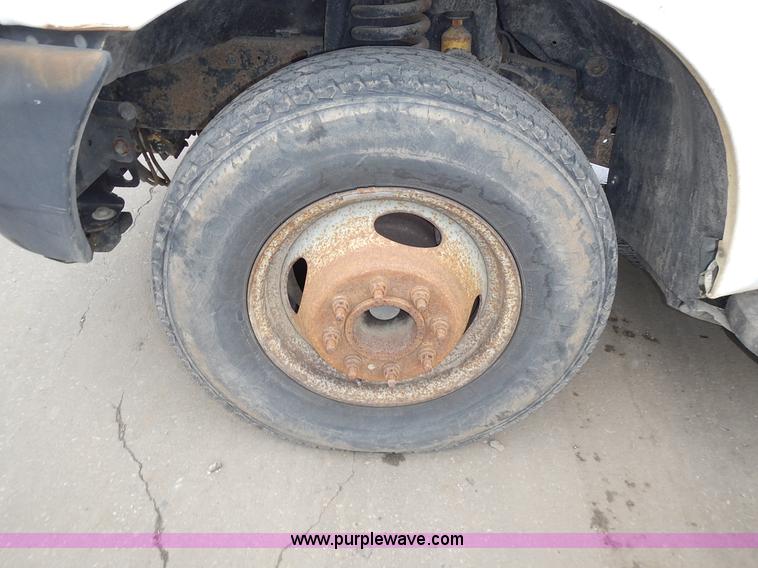 image for item L3573 1999 Ford F350 Super Duty XL flatbed pickup truck