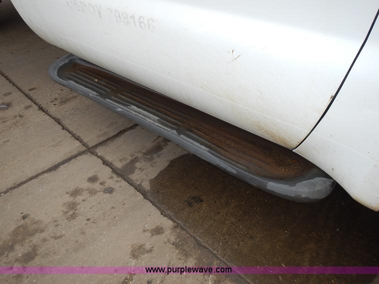 image for item L3573 1999 Ford F350 Super Duty XL flatbed pickup truck