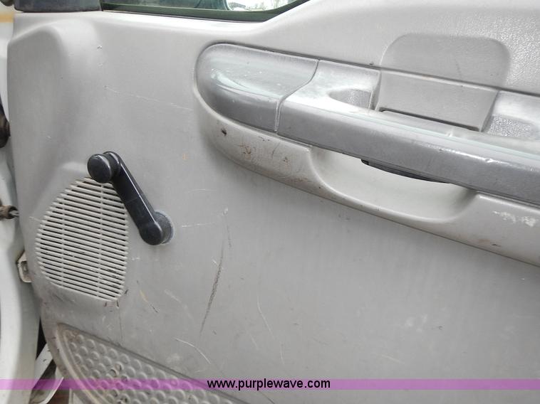 image for item L3573 1999 Ford F350 Super Duty XL flatbed pickup truck