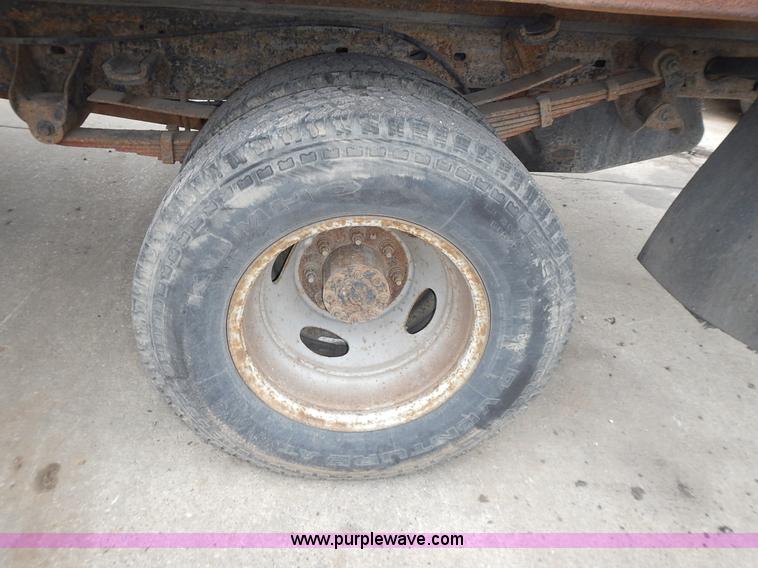 image for item L3573 1999 Ford F350 Super Duty XL flatbed pickup truck