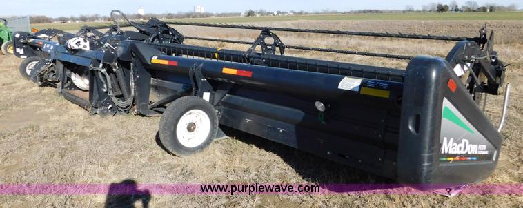 image for item J7472 2009 MacDon FD70 flex draper head