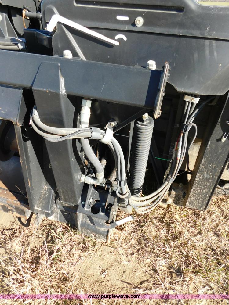 image for item J7472 2009 MacDon FD70 flex draper head