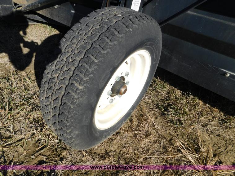 image for item J7472 2009 MacDon FD70 flex draper head