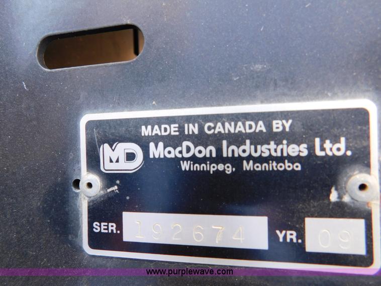 image for item J7472 2009 MacDon FD70 flex draper head