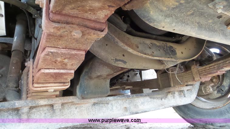 image for item J8431 1999 International 4900 seed tender truck