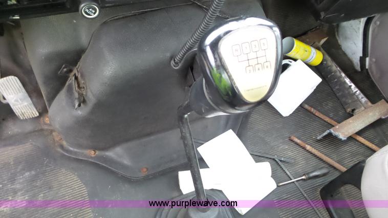 image for item J8431 1999 International 4900 seed tender truck