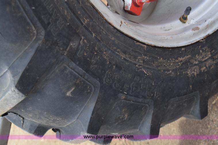 image for item L1054 Massey-Ferguson 150 tractor