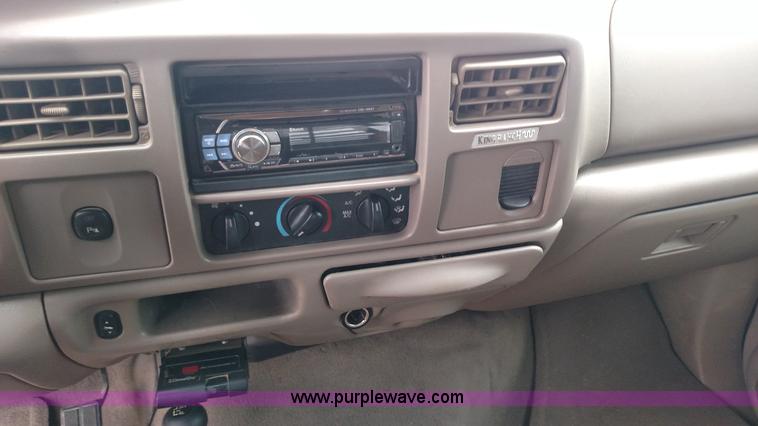 image for item L6038 2004 Ford F350 Super Duty Lariat King Ranch Crew Cab flatbed pickup truck