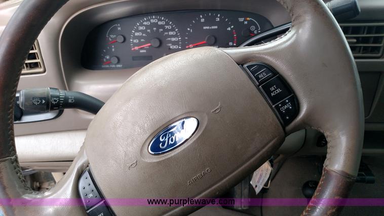 image for item L6038 2004 Ford F350 Super Duty Lariat King Ranch Crew Cab flatbed pickup truck