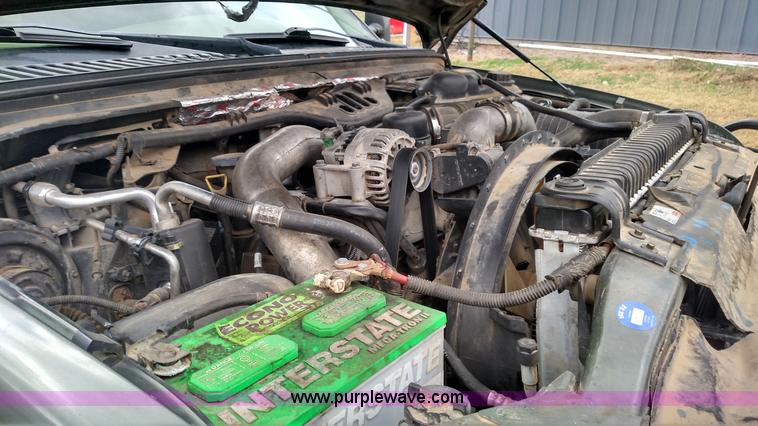 image for item L6038 2004 Ford F350 Super Duty Lariat King Ranch Crew Cab flatbed pickup truck