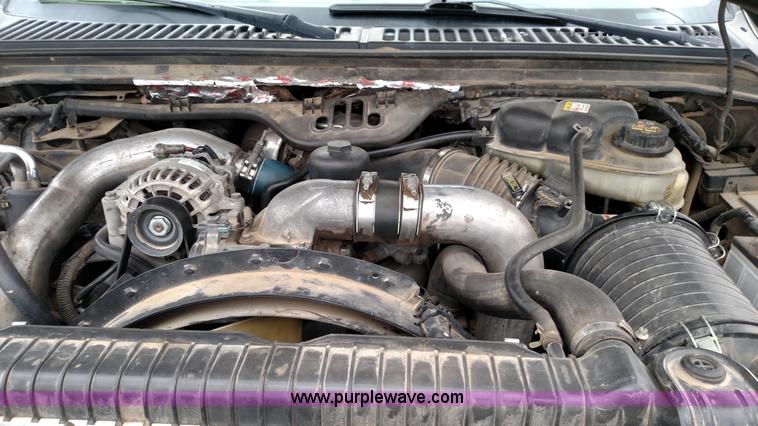 image for item L6038 2004 Ford F350 Super Duty Lariat King Ranch Crew Cab flatbed pickup truck