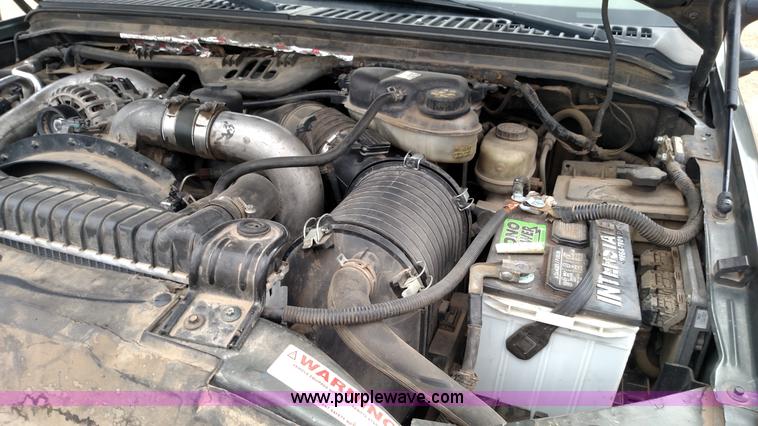 image for item L6038 2004 Ford F350 Super Duty Lariat King Ranch Crew Cab flatbed pickup truck