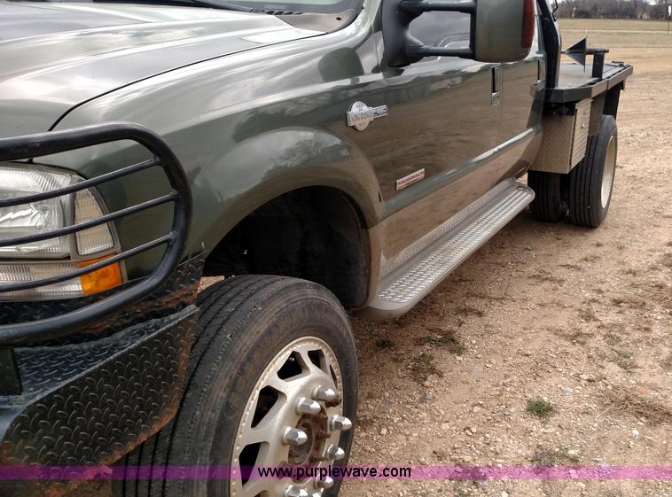 image for item L6038 2004 Ford F350 Super Duty Lariat King Ranch Crew Cab flatbed pickup truck