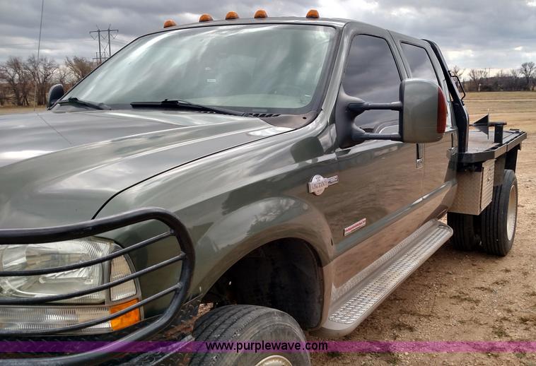 image for item L6038 2004 Ford F350 Super Duty Lariat King Ranch Crew Cab flatbed pickup truck