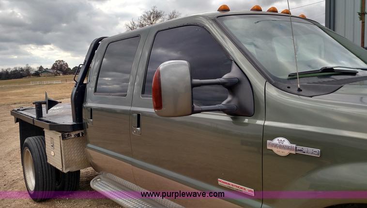 image for item L6038 2004 Ford F350 Super Duty Lariat King Ranch Crew Cab flatbed pickup truck