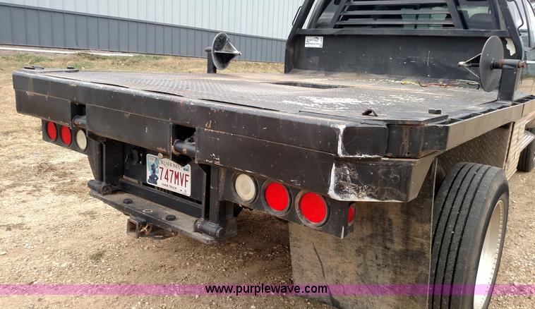 image for item L6038 2004 Ford F350 Super Duty Lariat King Ranch Crew Cab flatbed pickup truck