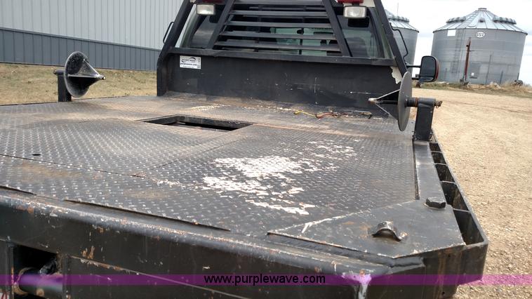 image for item L6038 2004 Ford F350 Super Duty Lariat King Ranch Crew Cab flatbed pickup truck