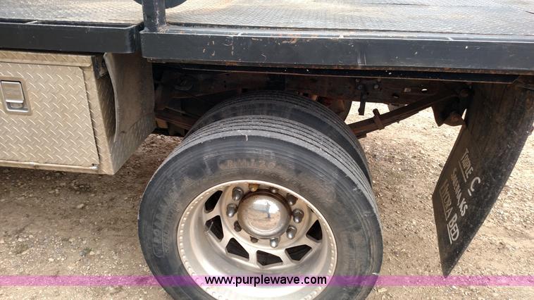 image for item L6038 2004 Ford F350 Super Duty Lariat King Ranch Crew Cab flatbed pickup truck