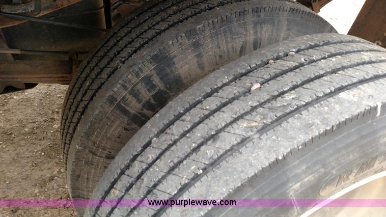 image for item L6038 2004 Ford F350 Super Duty Lariat King Ranch Crew Cab flatbed pickup truck