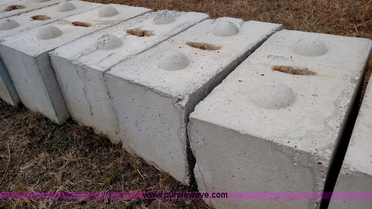 image for item L6051 (12) concrete barrier blocks