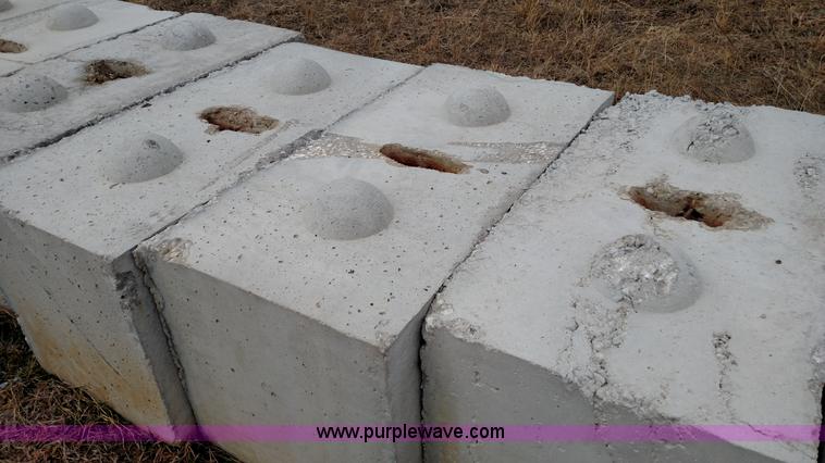 image for item L6051 (12) concrete barrier blocks