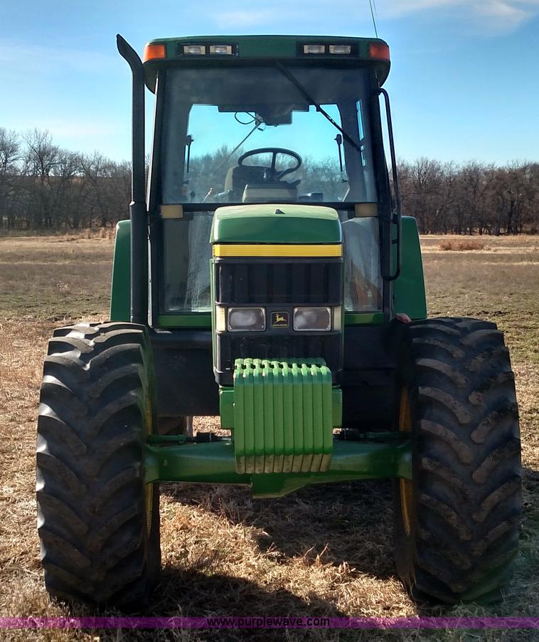 image for item L6088 1999 John Deere 7210 MFWD tractor