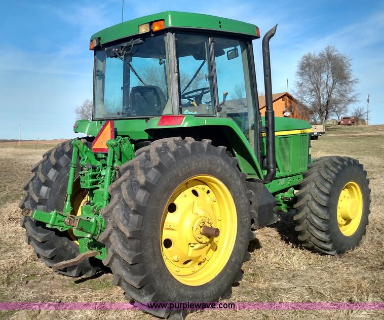 image for item L6088 1999 John Deere 7210 MFWD tractor