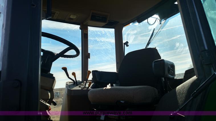 image for item L6088 1999 John Deere 7210 MFWD tractor