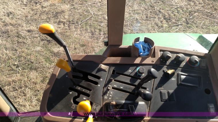 image for item L6088 1999 John Deere 7210 MFWD tractor